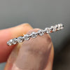 Round moissanite wedding band crafted with precision and designed for long-lasting wear.