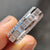 Unisex wedding band featuring a round cut moissanite, ideal for both men and women.