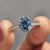 Oval cut moissanite ring with trellis style ring

