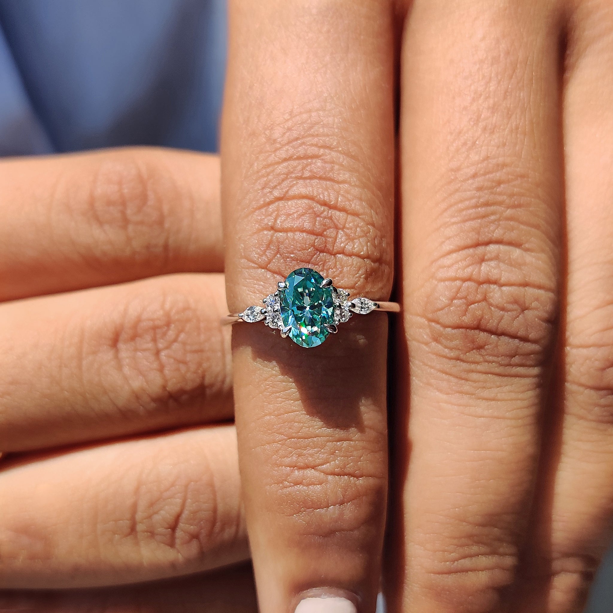 Carat Diamonds engagement ring featuring a handmade oval cut design.