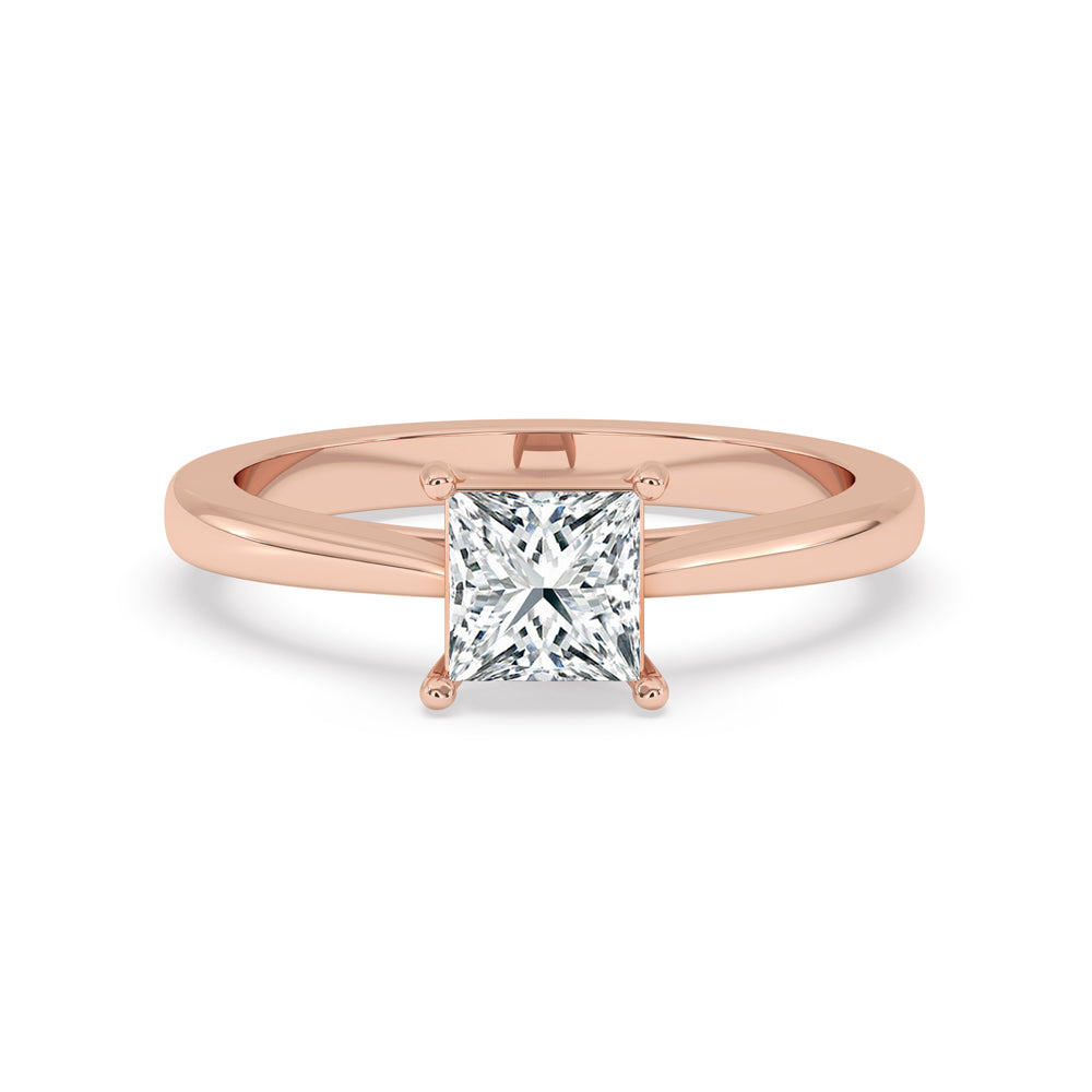Princess Cut Solitaire Diamond Ring with a sleek four prong ring setting and tapered ring shank.
