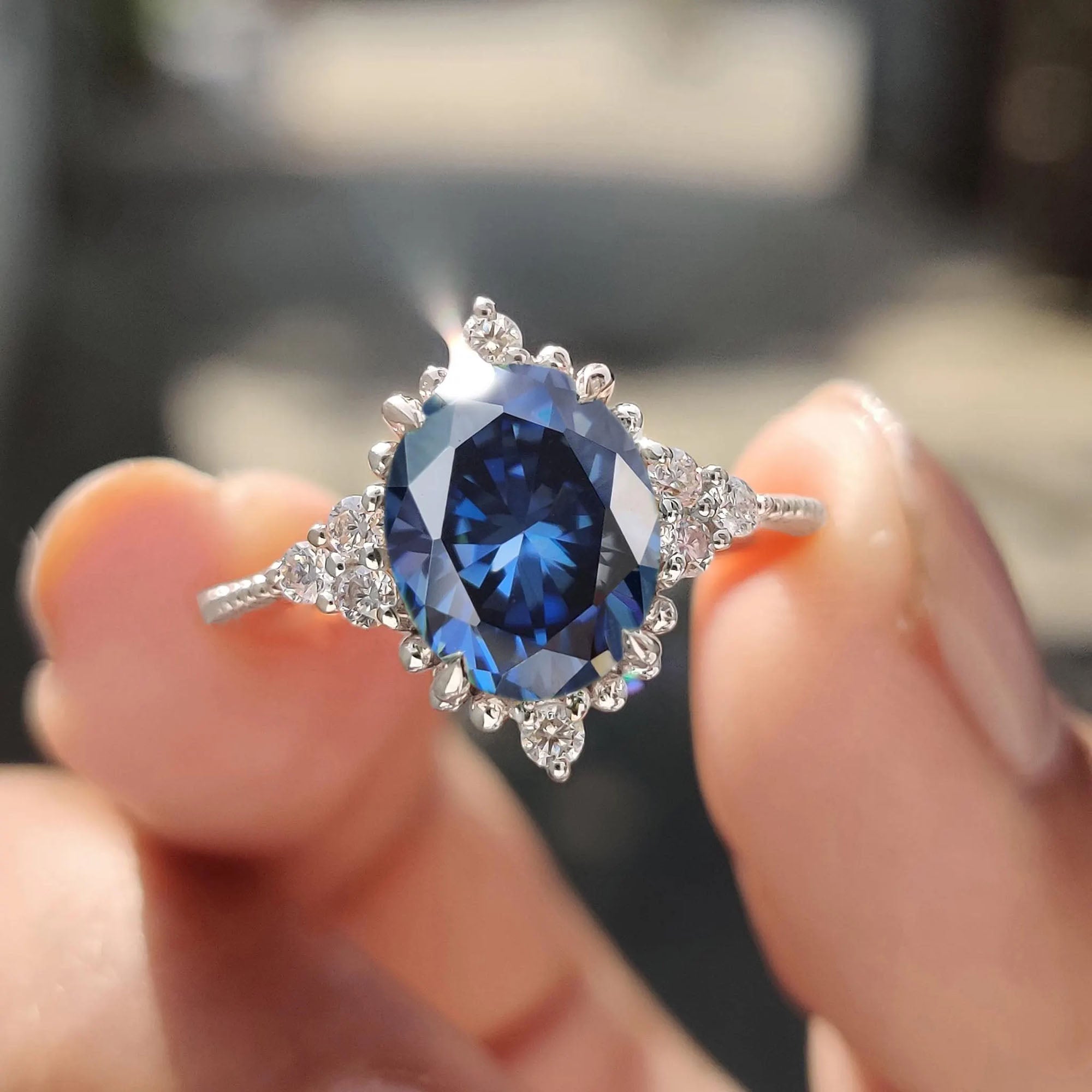 Milgrain engagement ring shows detailed edges with a handcrafted design.
