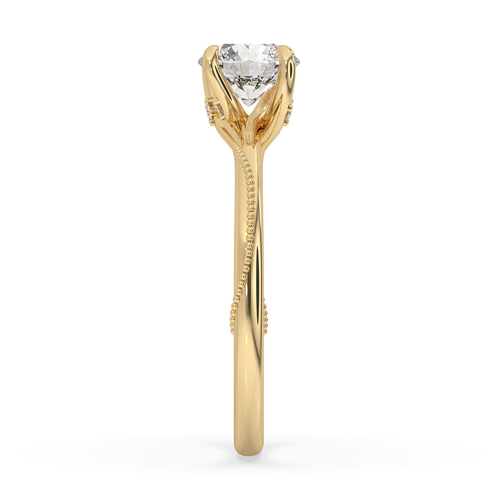 Yellow gold ring with round cut diamonds and a beautiful milgrain finish.
