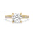 Cushion cut hidden halo engagement ring with pave setting in yellow gold.
