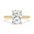 Elongated cushion cut ring in a solitaire setting with a yellow gold band.

