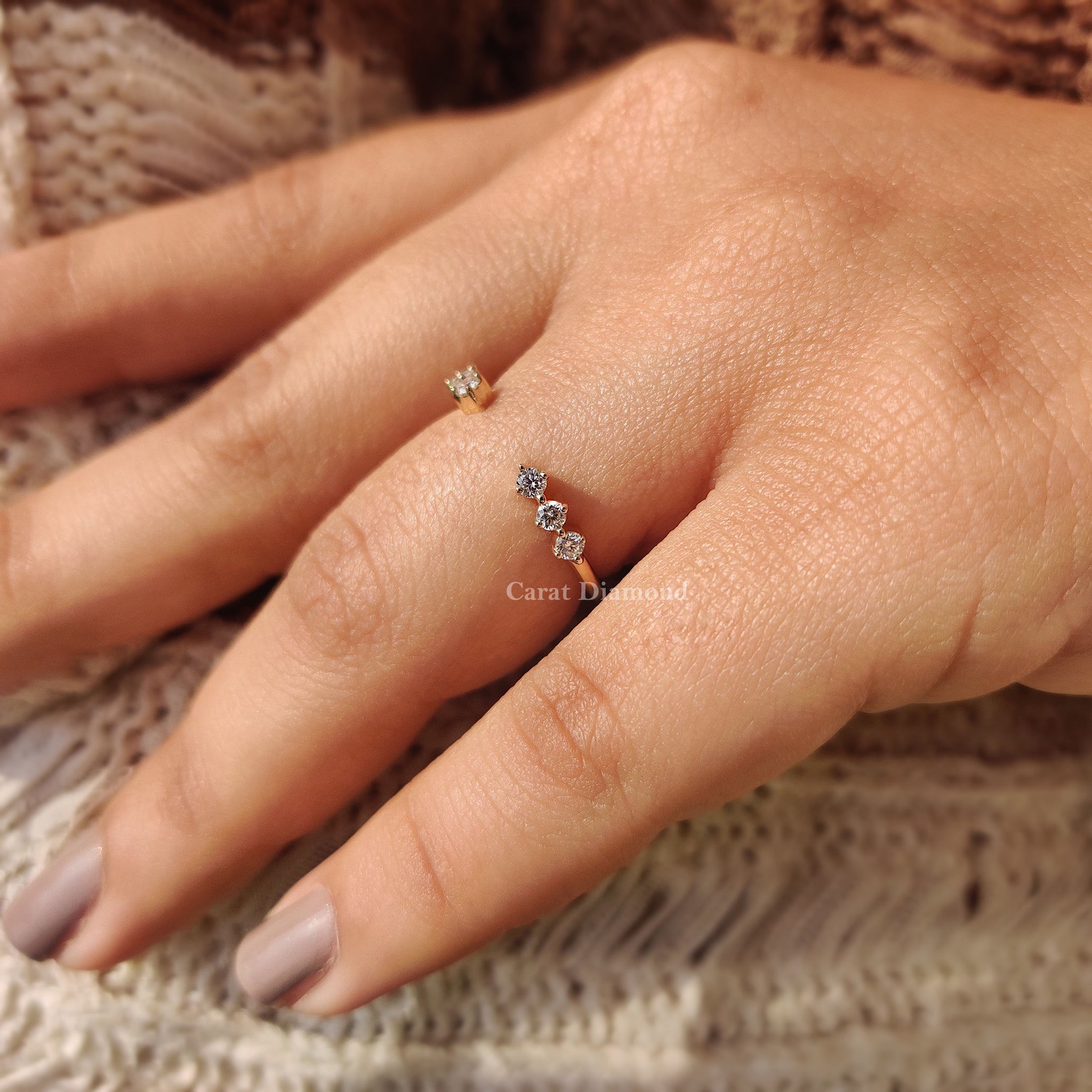 Yellow gold engagement band highlighted in natural light.
