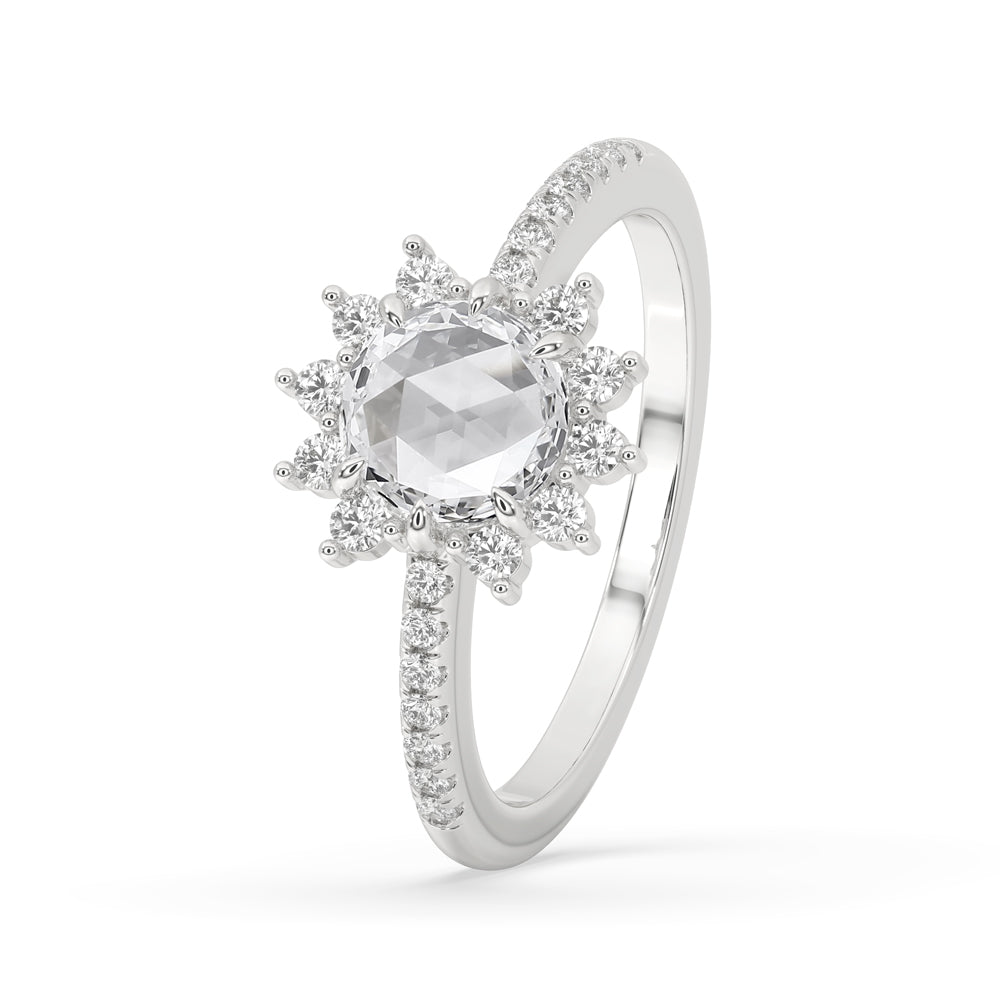 Halo diamond engagement ring in a prong ring design with a stunning white gold band for modern sophistication.