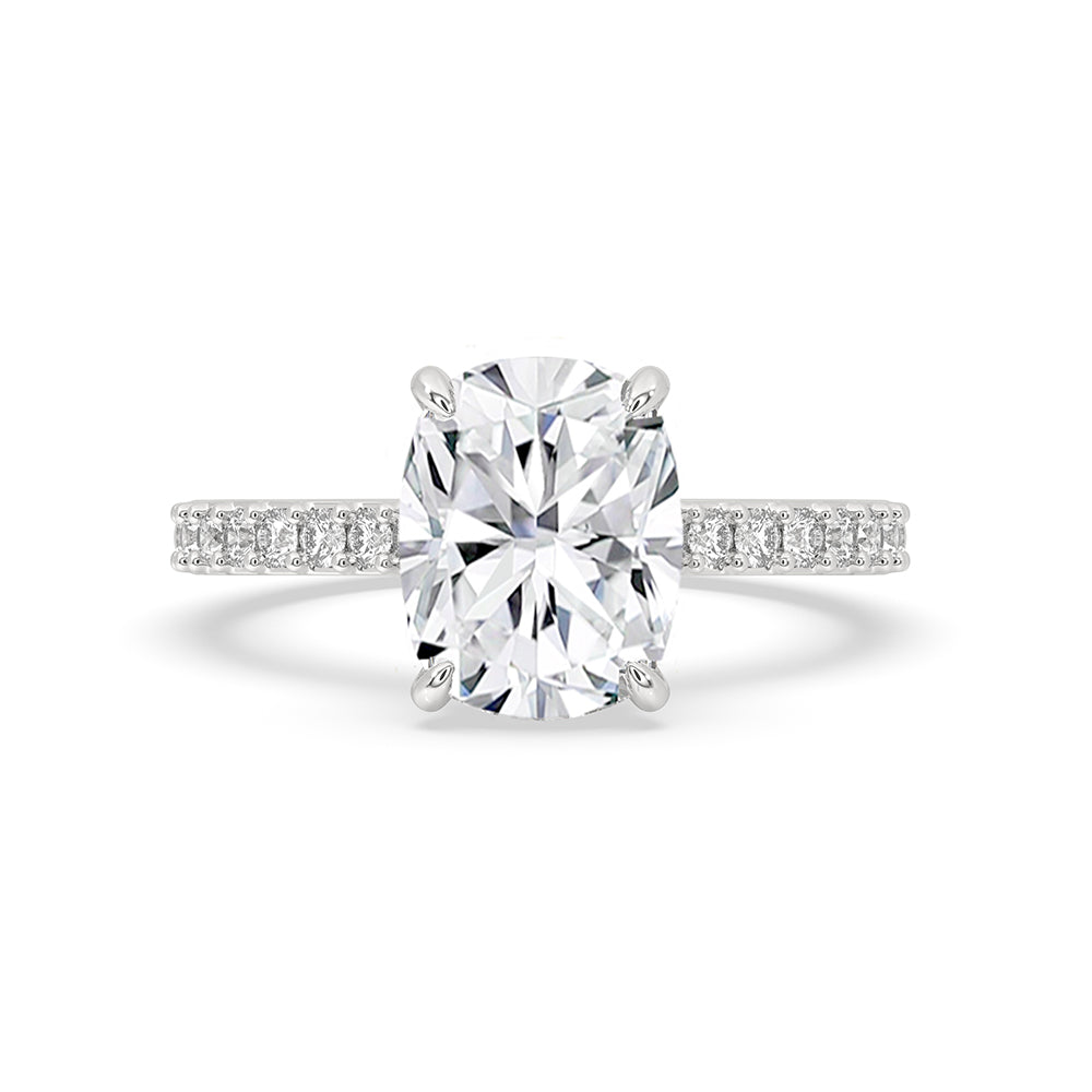 Elongated cushion cut diamond ring with hidden halo ring design.

