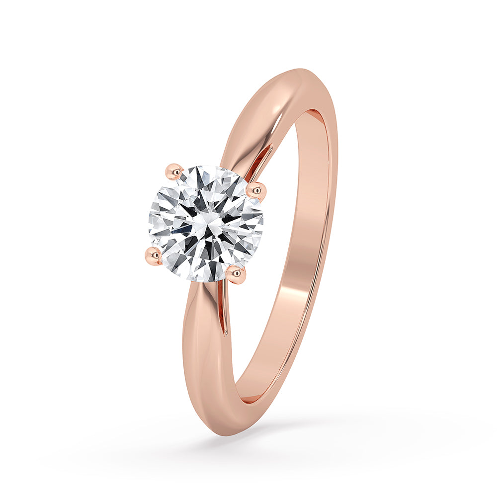Round Cut Diamond Ring set in a beautiful prong setting with rose gold.
