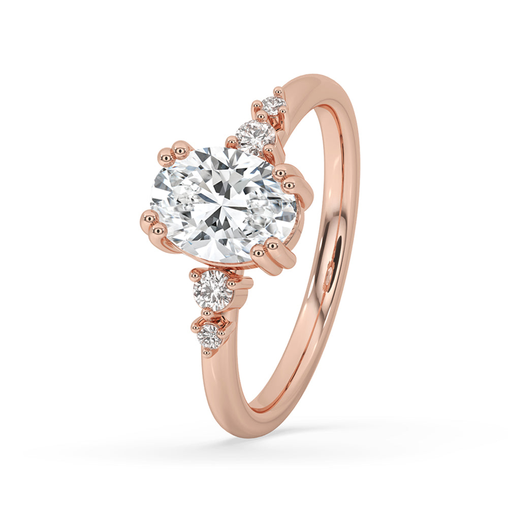 Rose gold oval diamond ring with a double prong engagement ring setting and a carat diamonds ring appeal.