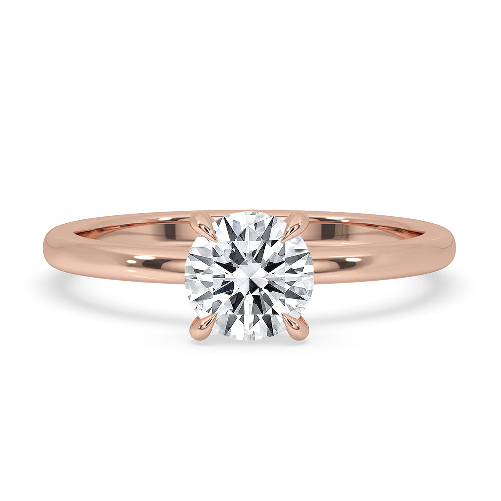 Round cut engagement ring with a solitaire setting.

