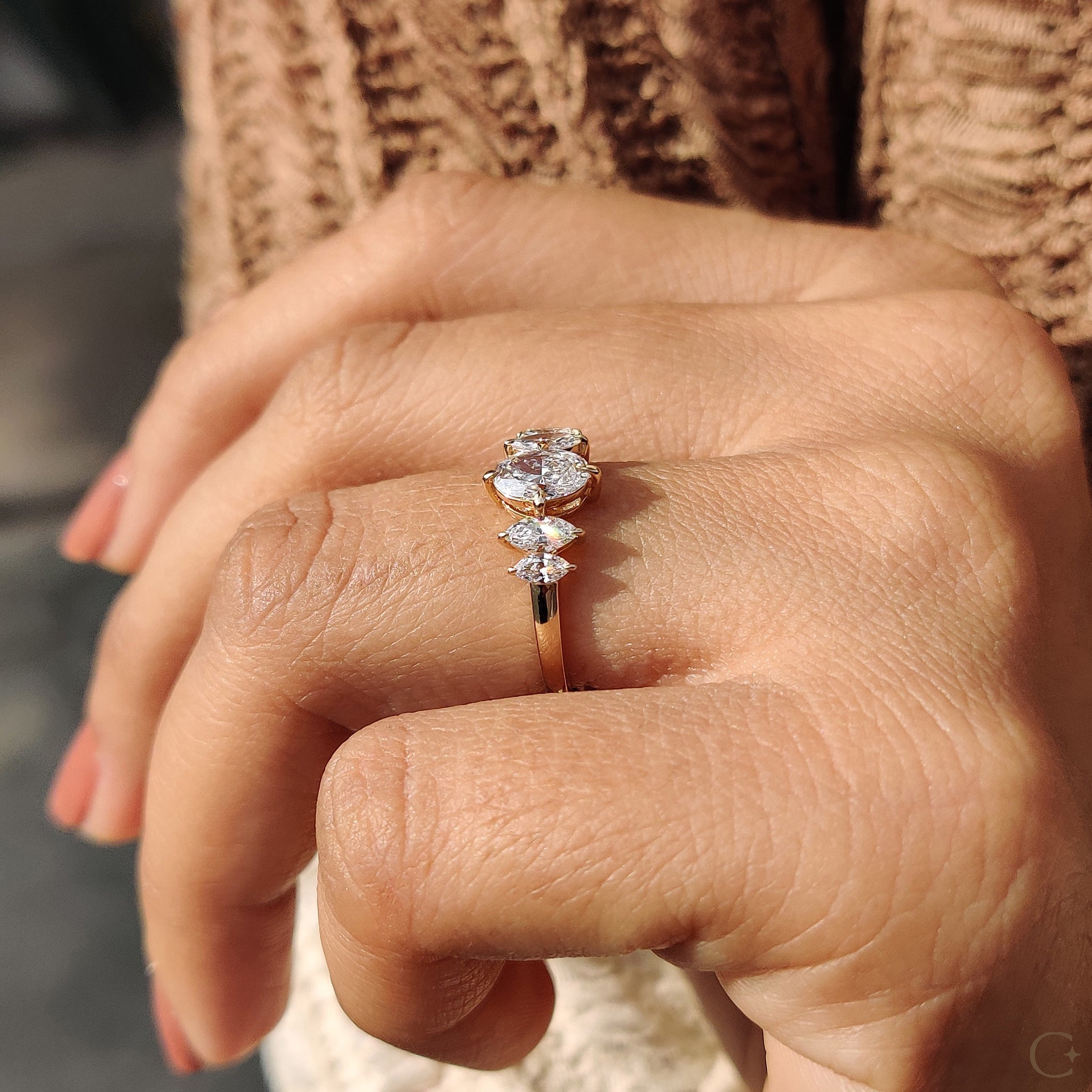 Yellow gold diamond ring with lab-grown diamonds.
