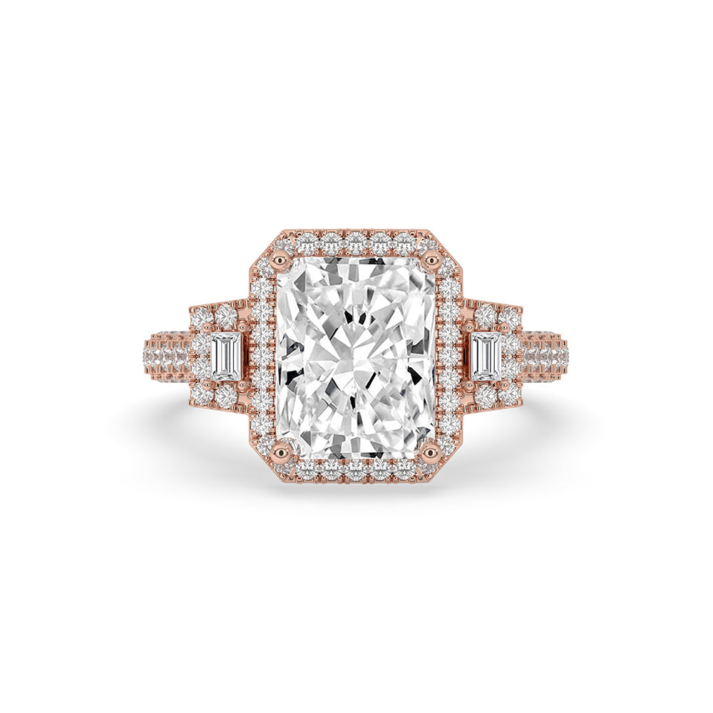 Radiant cut ring with a baguette side stone ring in a halo engagement ring style.
