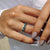 Full eternity wedding band with channel set stones for continuous brilliance.