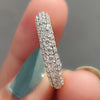 White gold wedding band shines with a clean finish.
