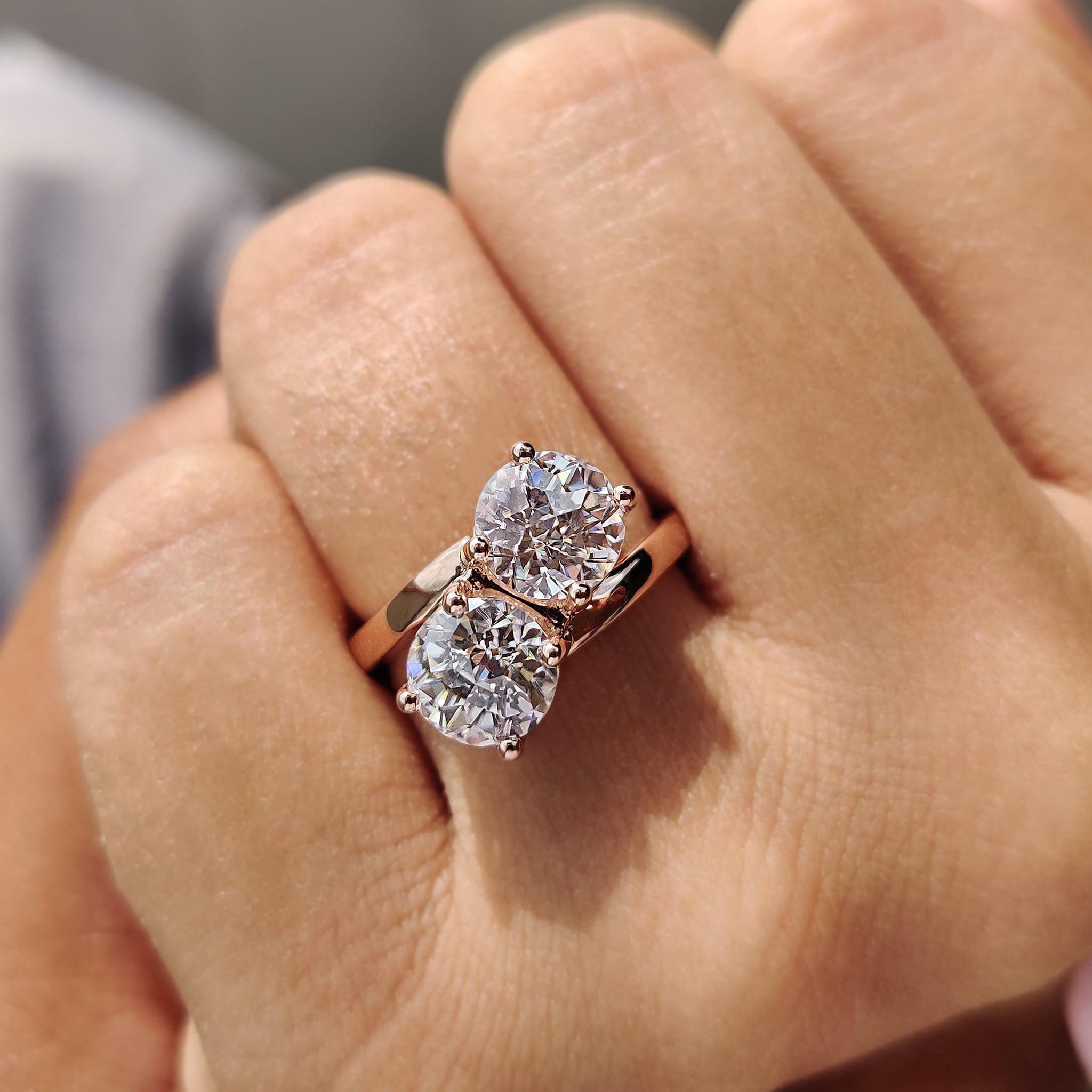 Jubilee ring shines with character in a unique twin-stone layout.
