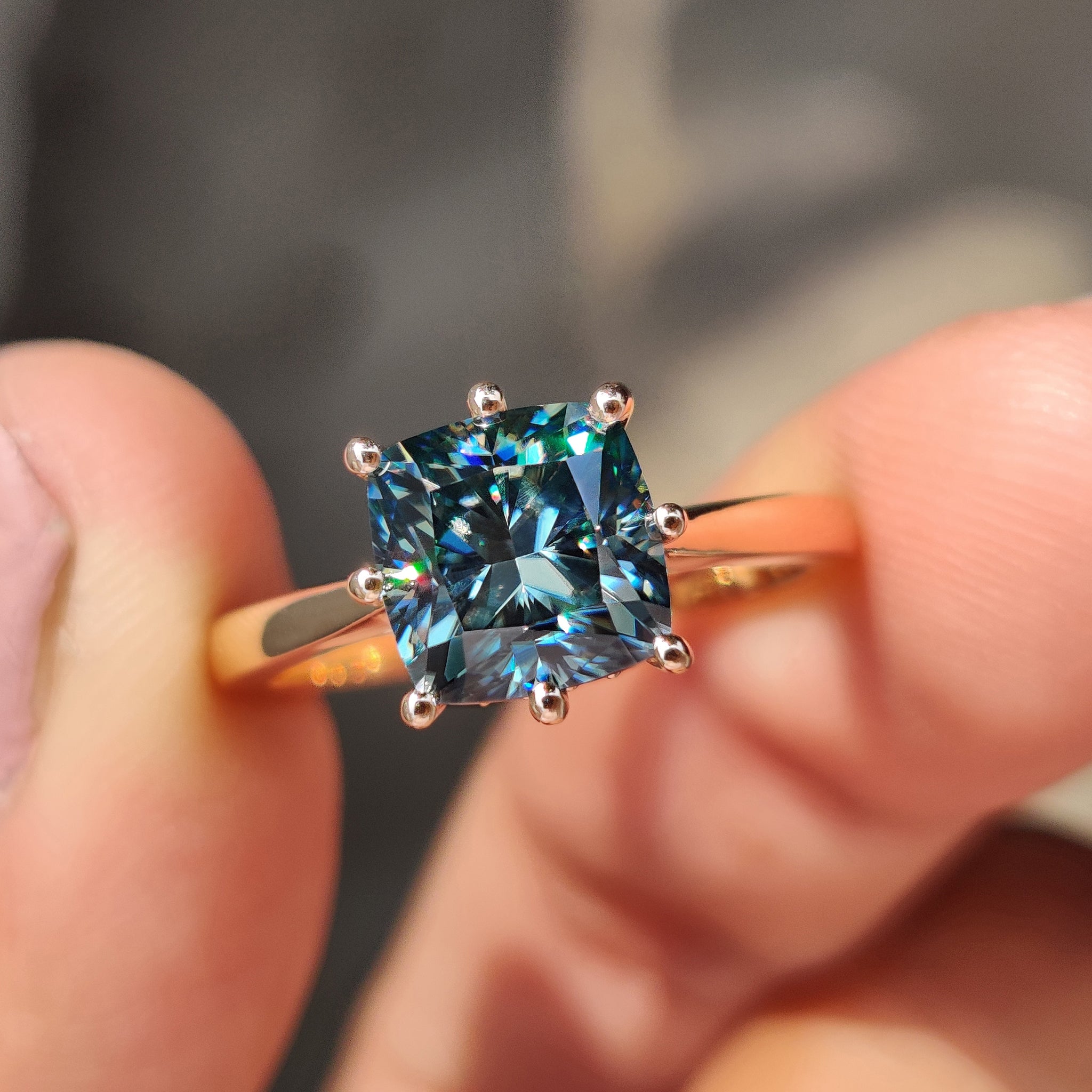 Cushion cut engagement ring glows with graceful soft curves.