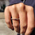 Marquise and round wedding band blends two classic shapes.