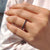 Prong set band with black stones crafted in a clean half eternity layout.