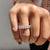 Moissanite oval eternity band featuring continuous oval cut stones for maximum brilliance and elegance.