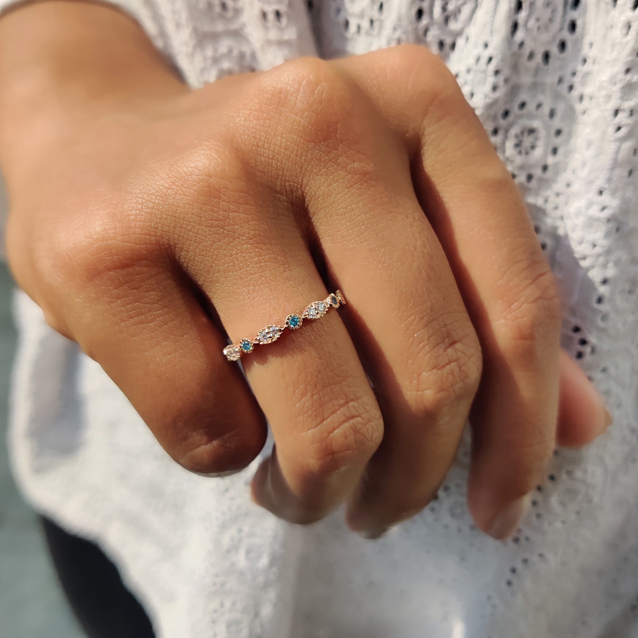 Buy a Moissanite band for lasting brilliance.