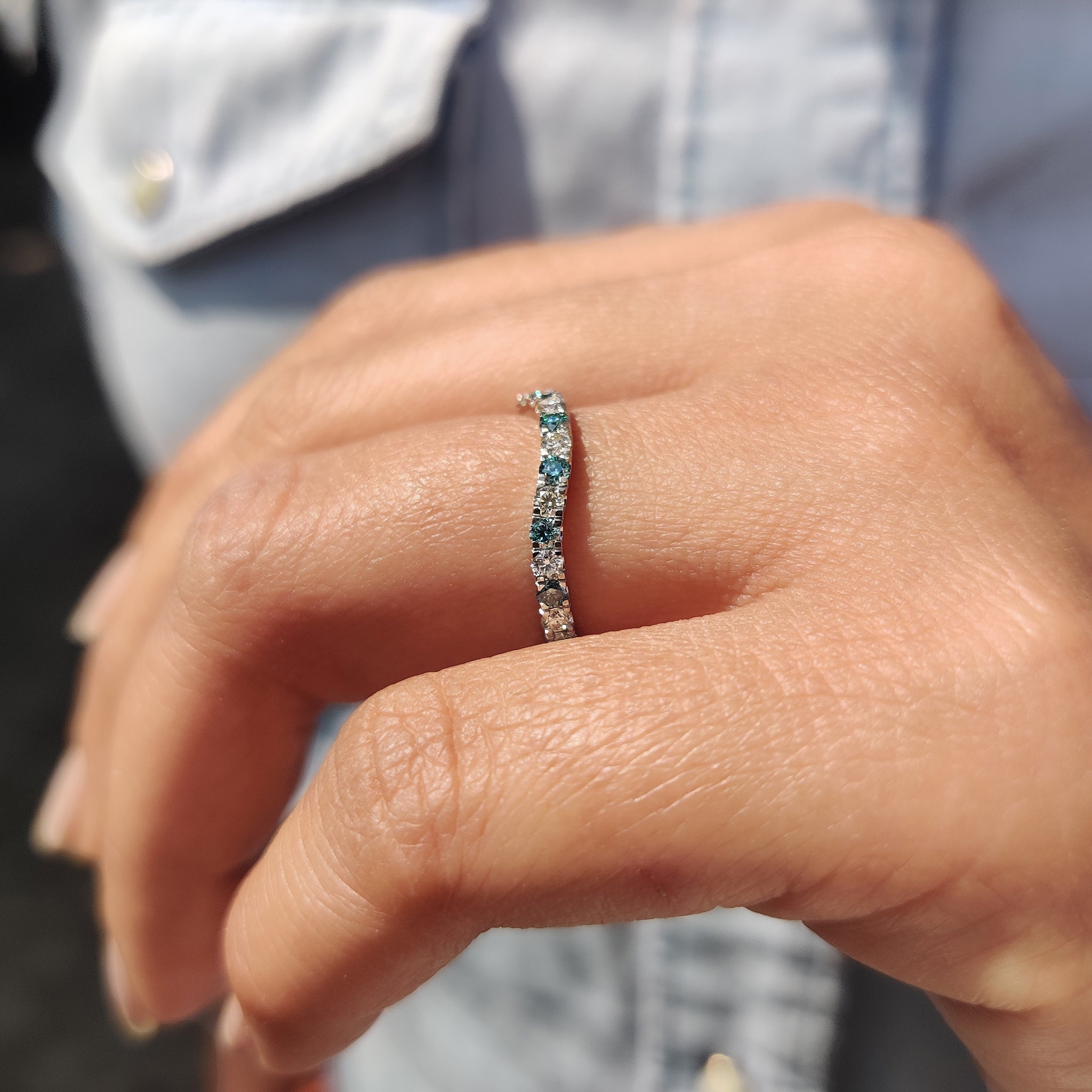 Handmade band with intricate detailing and premium cyan blue stones.