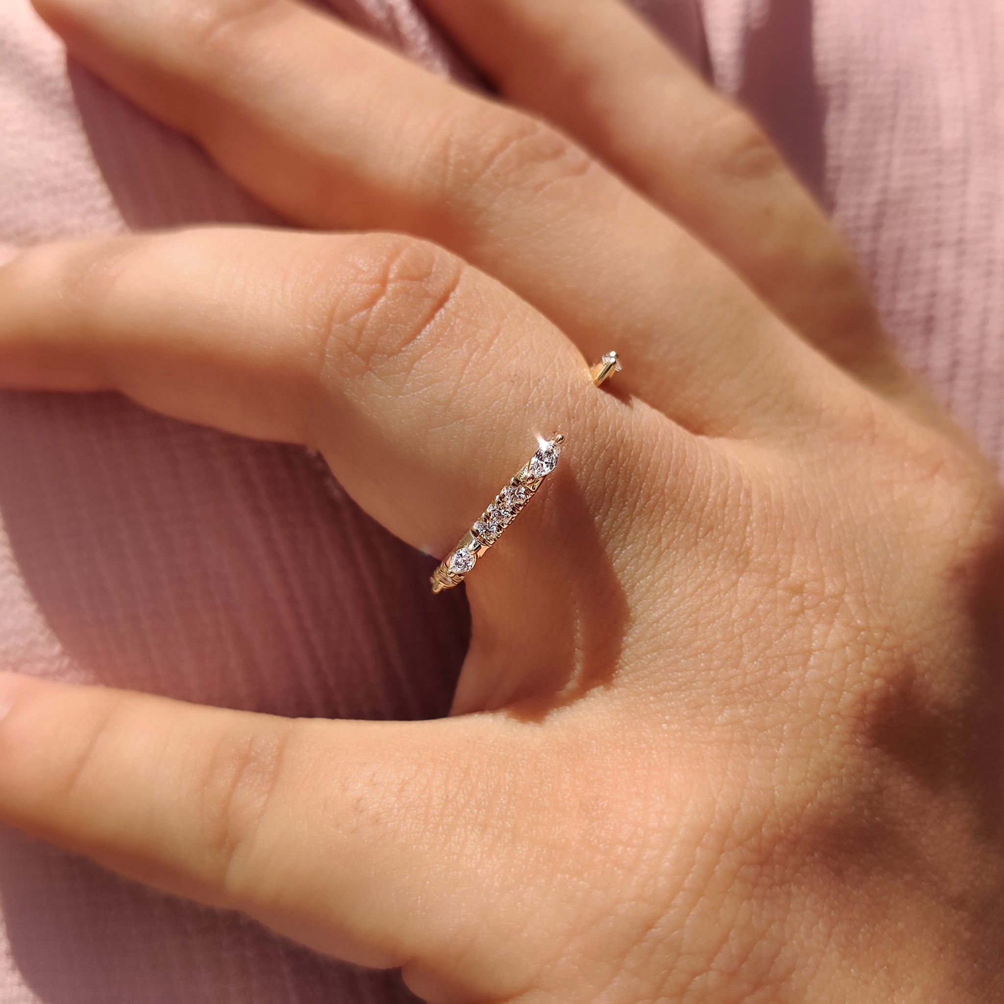 Yellow gold diamond band with a classic design.
