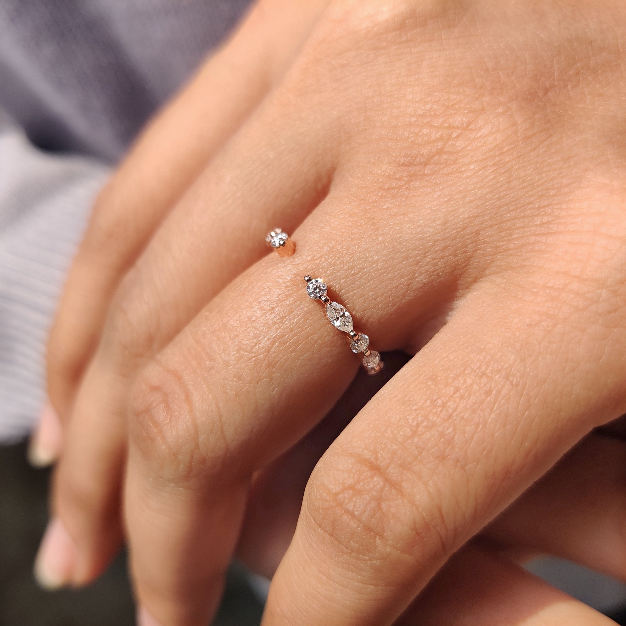 Marquise and round wedding band, a beautiful round cut band with Moissanite stones.