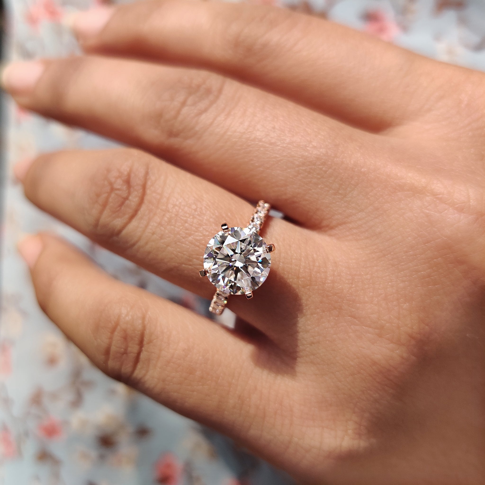 Pave setting band adds bright flow around your gem.