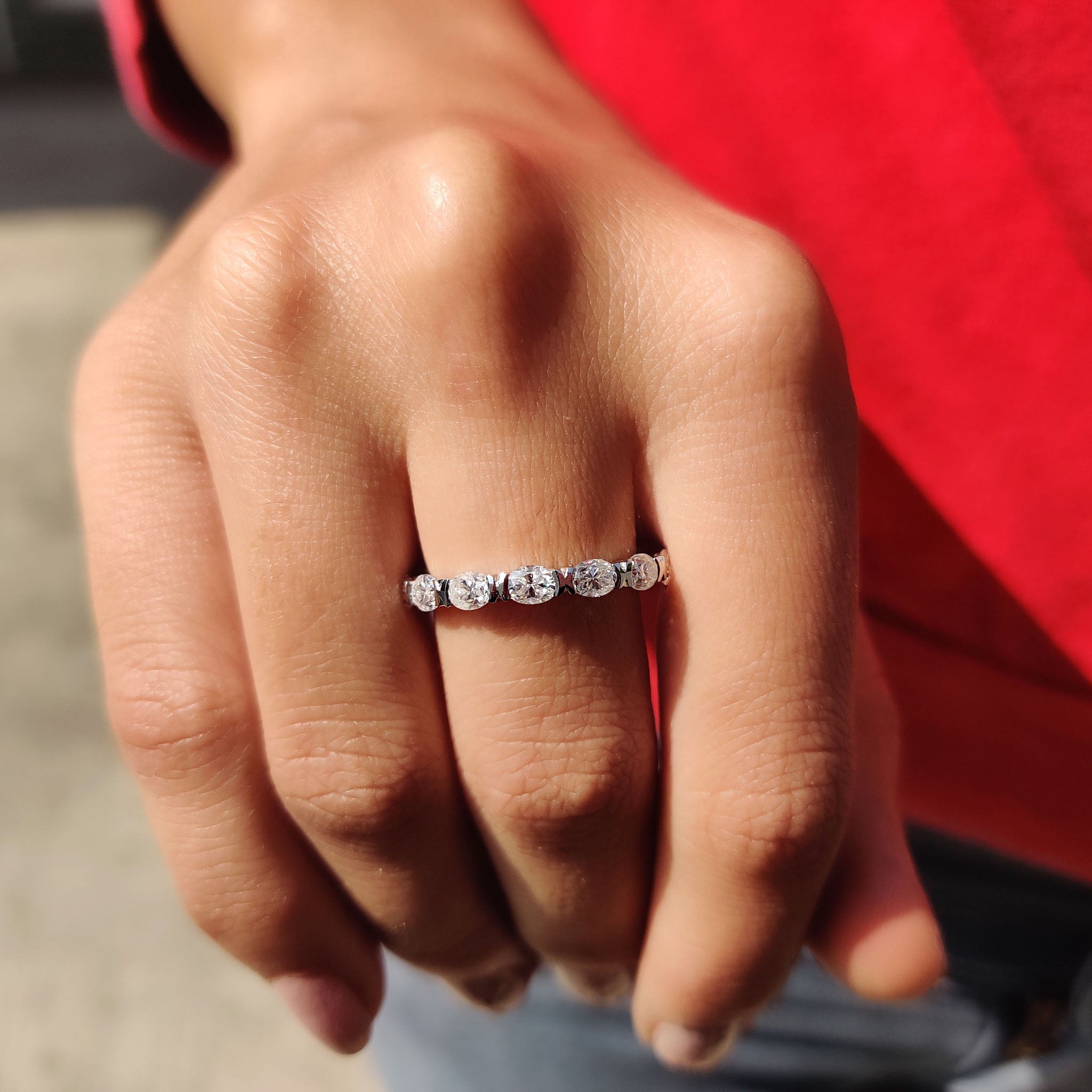Custom wedding band available in East West or classic oval settings, made to order.