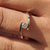 Bypass diamond ring with a sleek twisted design.
