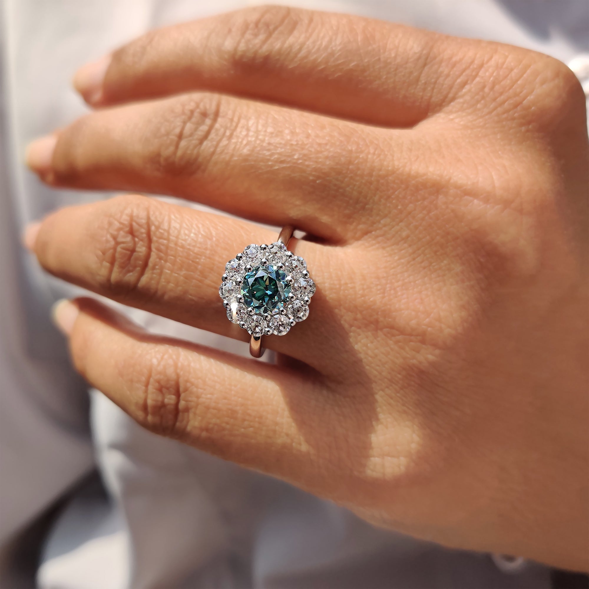 Moisenite ring captures forever in soft colorful fire.