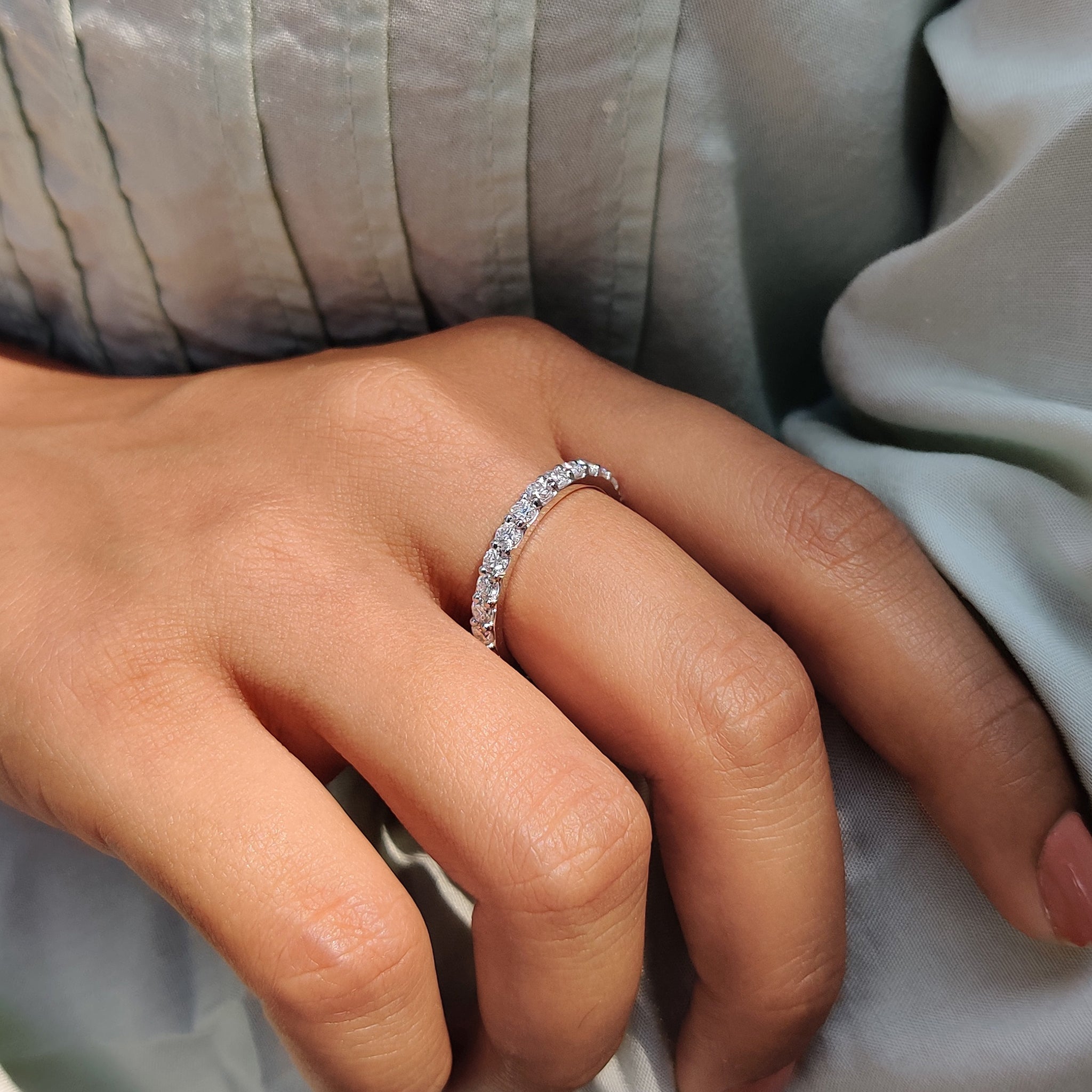 Handmade jewelry with carat diamonds wedding band.