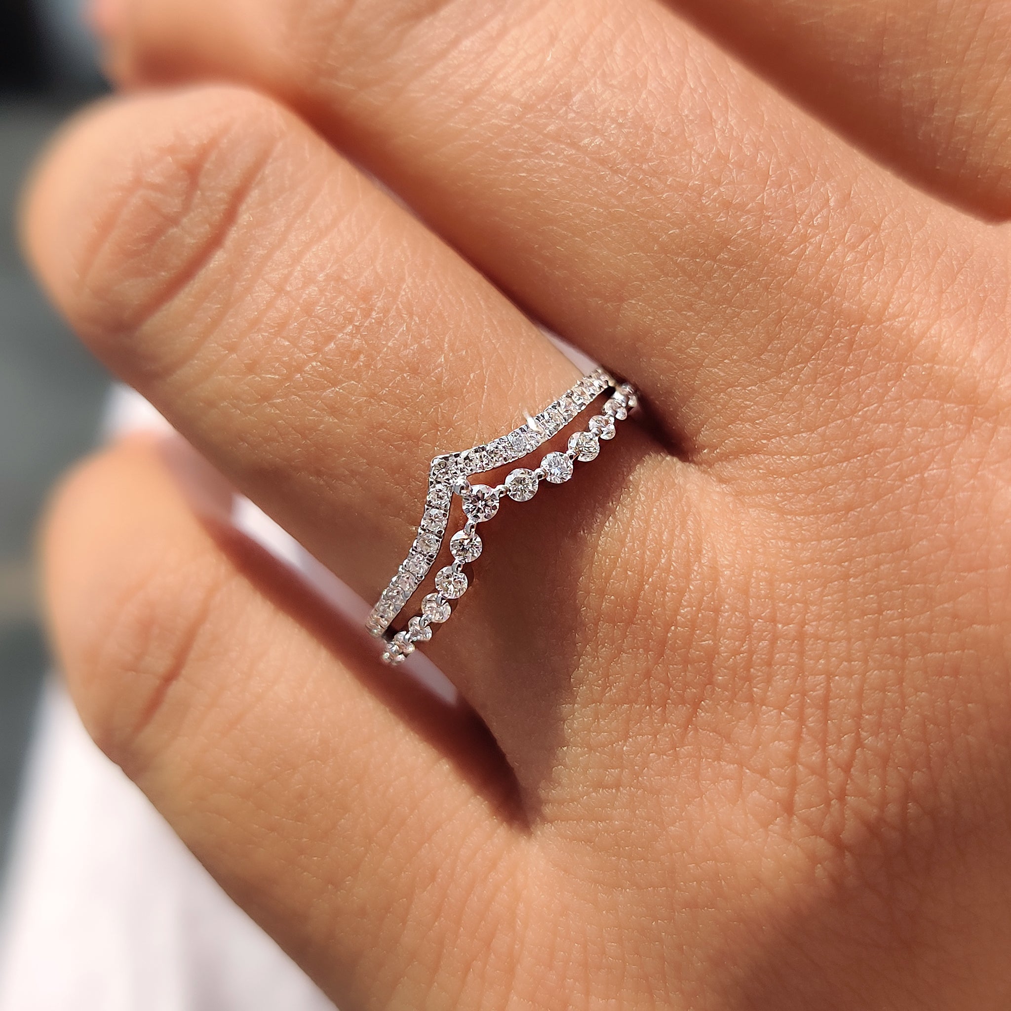 Chevron Diamond Wedding Band with round diamonds in white gold.
