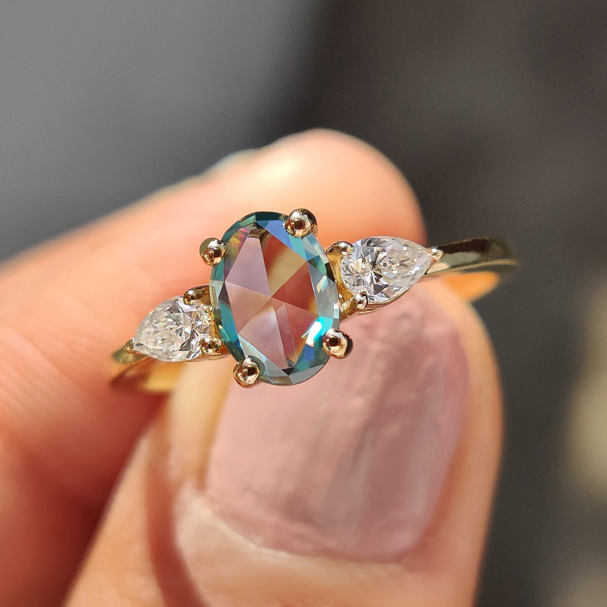 Cyan blue oval rose cut Moissanite three stone engagement ring