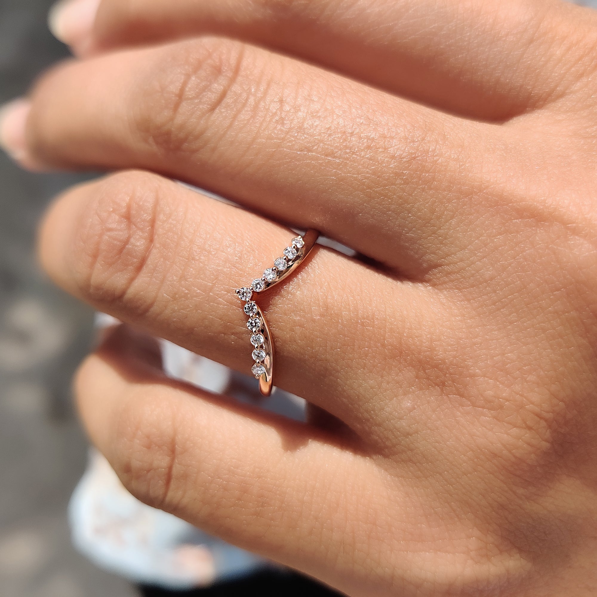 Handmade band featuring tiara-inspired structure and clean round stone arrangement.