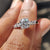 Side stone engagement ring featuring marquise accents, designed with a modern touch and expert craftsmanship for lasting quality.

