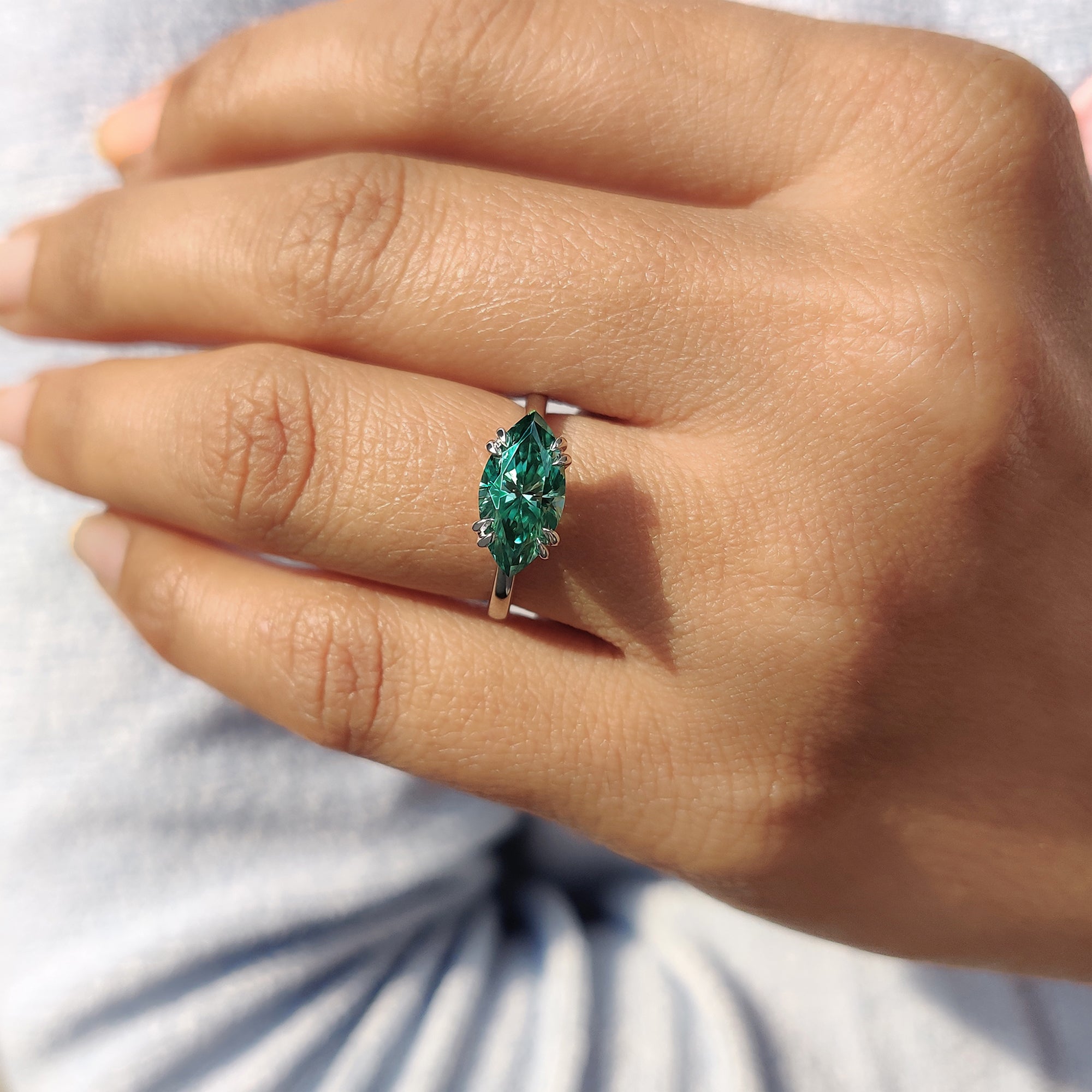 East to west marquise cut Moissanite engagement ring