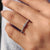 Round and baguette diamond band in white gold.
