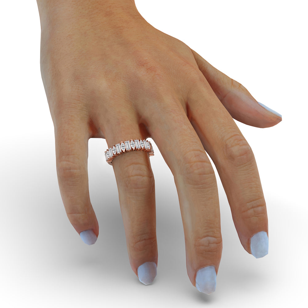 Handmade band with baguette cut diamonds, ideal for unique and stylish jewellery lovers.