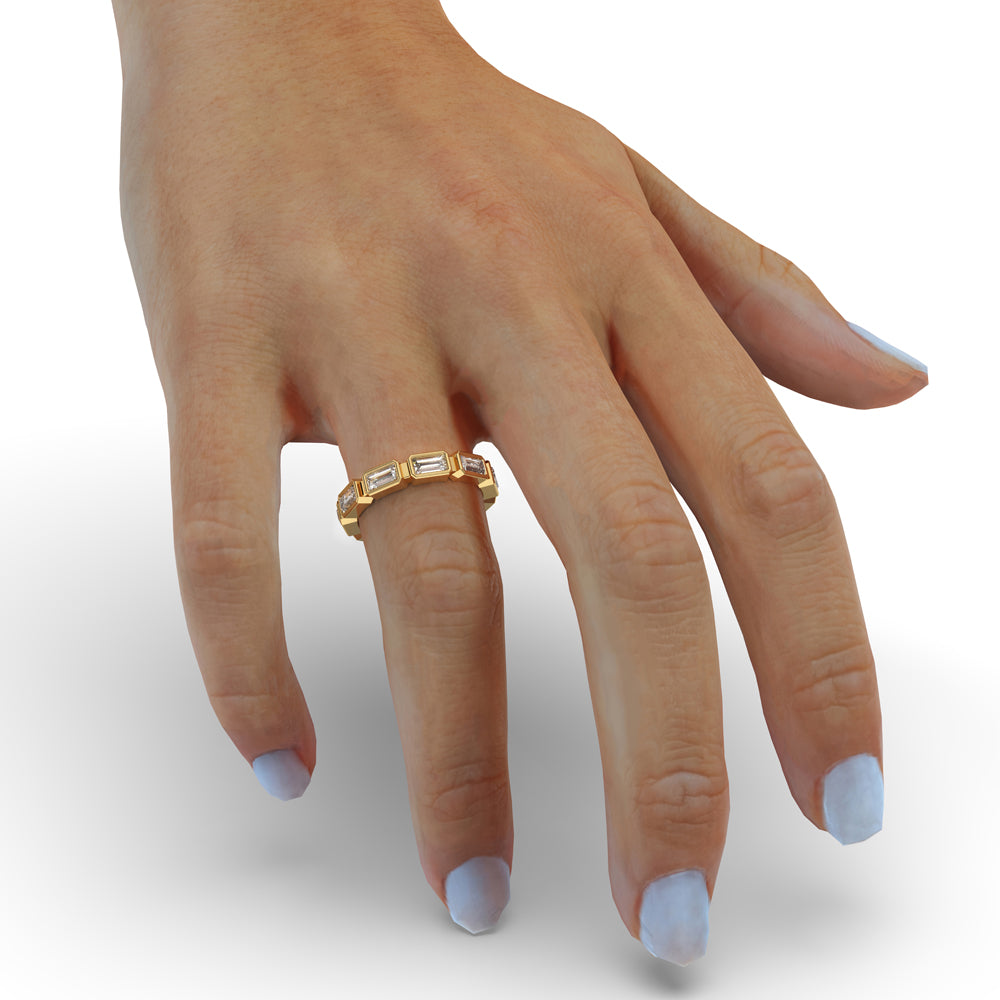 Baguette diamond band with a sleek bezel setting for a timeless wedding style.
