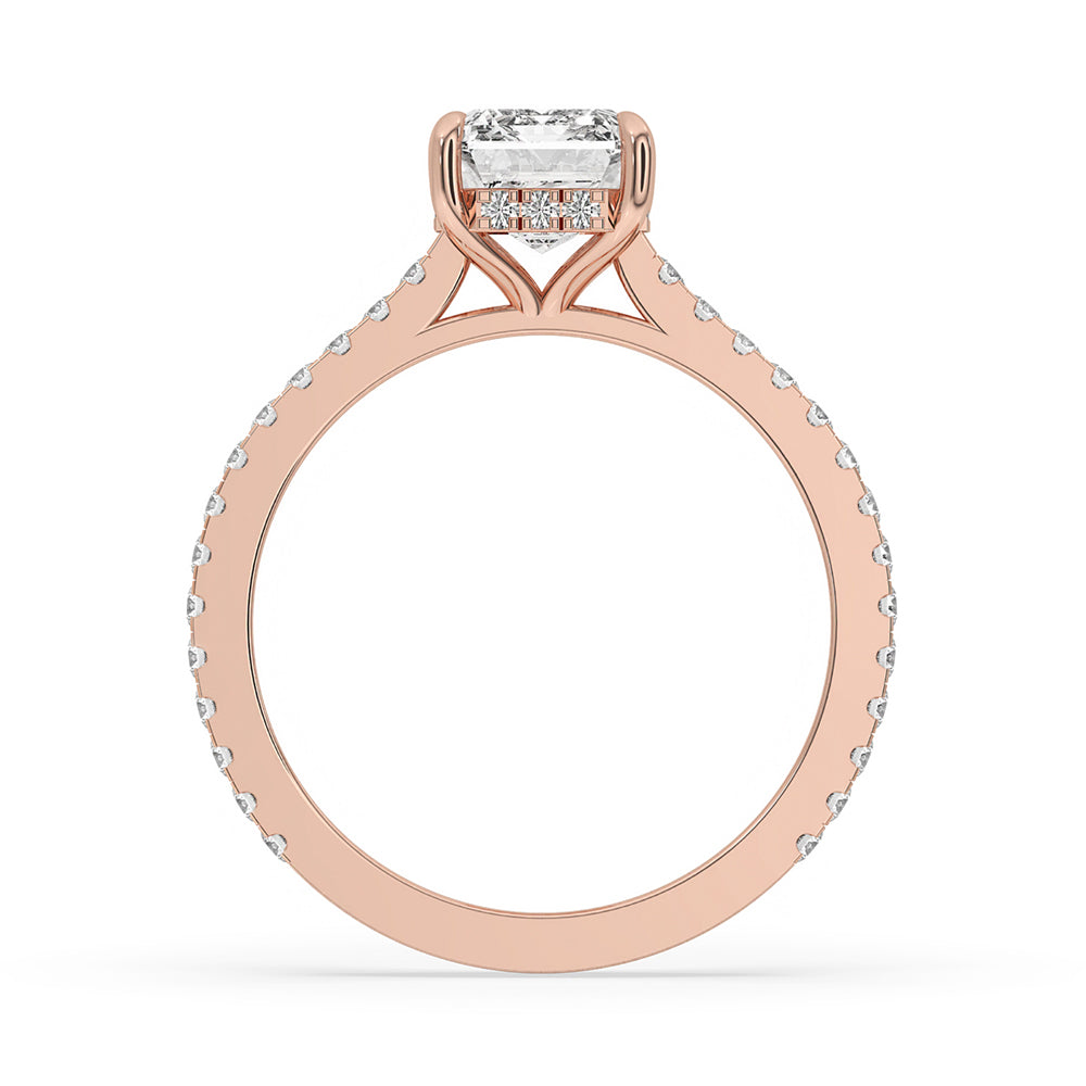 Stunning emerald cut engagement ring with hidden halo ring and cathedral diamond setting, showcasing an IGI certified Lab Grown Diamond.
