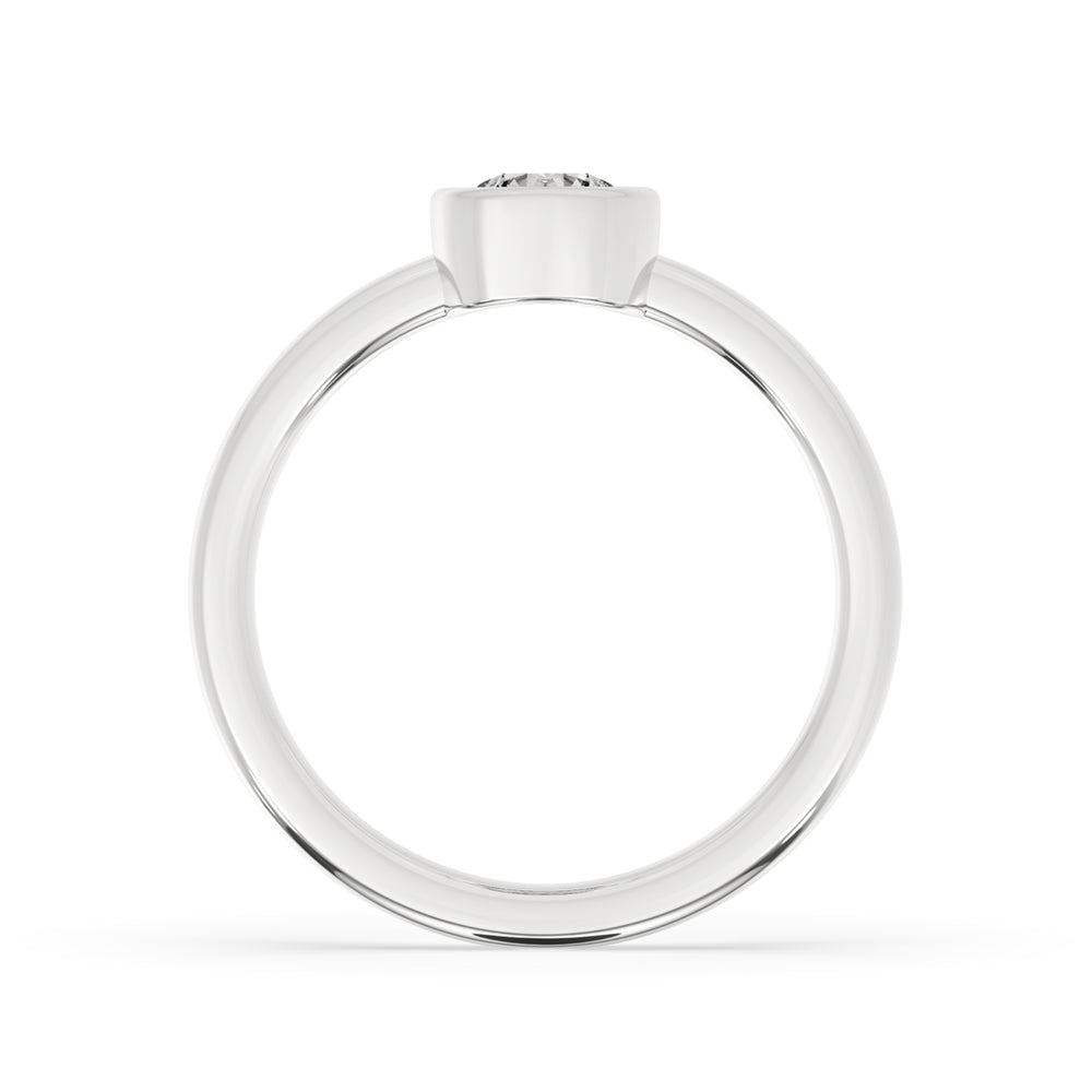 Elegant round diamond engagement ring featuring a bezel set engagement ring, securely holding the center diamond.
