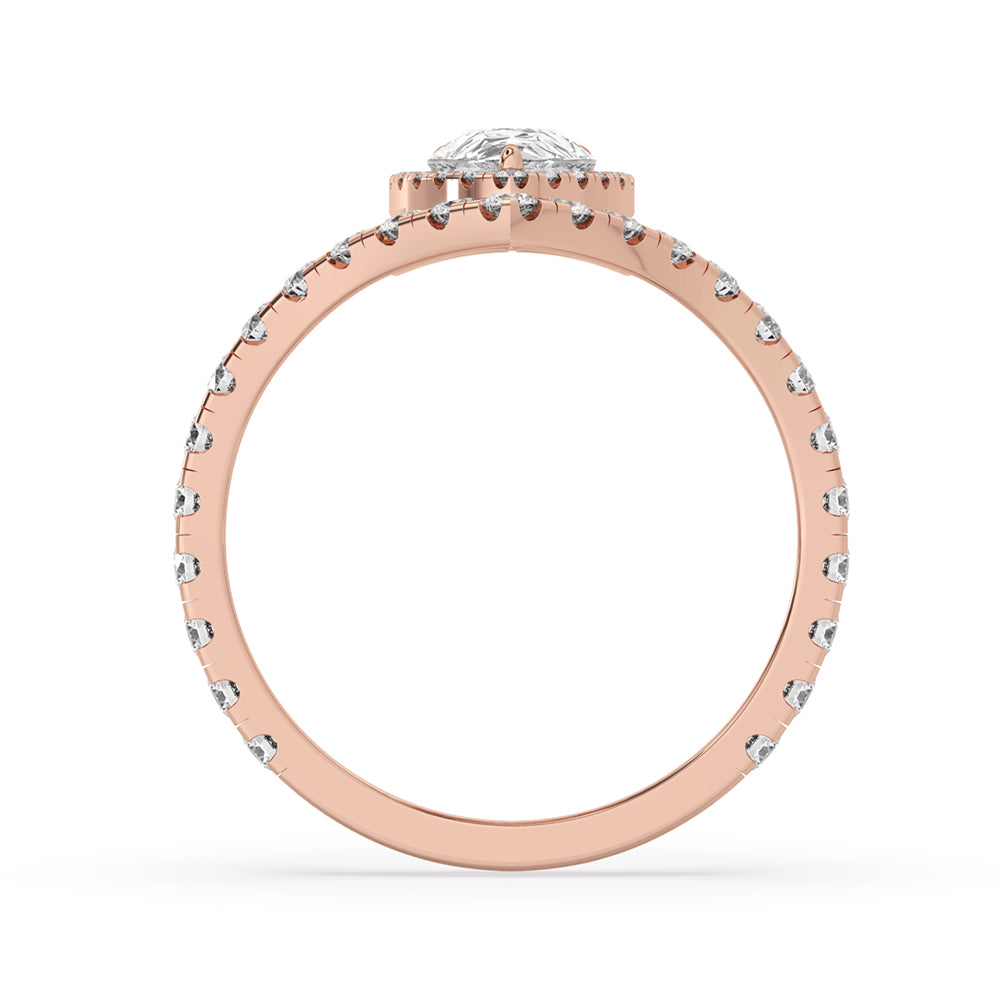 Pear shaped halo engagement ring adorned with chevron diamonds, showcasing a beautiful blend of elegance and style.