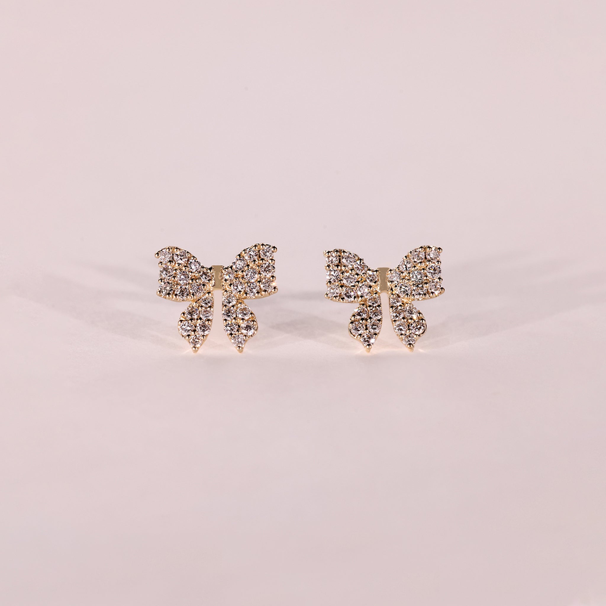 Lab grown diamond bow earrings designed for modern style
