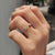 2 stone wedding band crafted in white gold with a clean open front design.