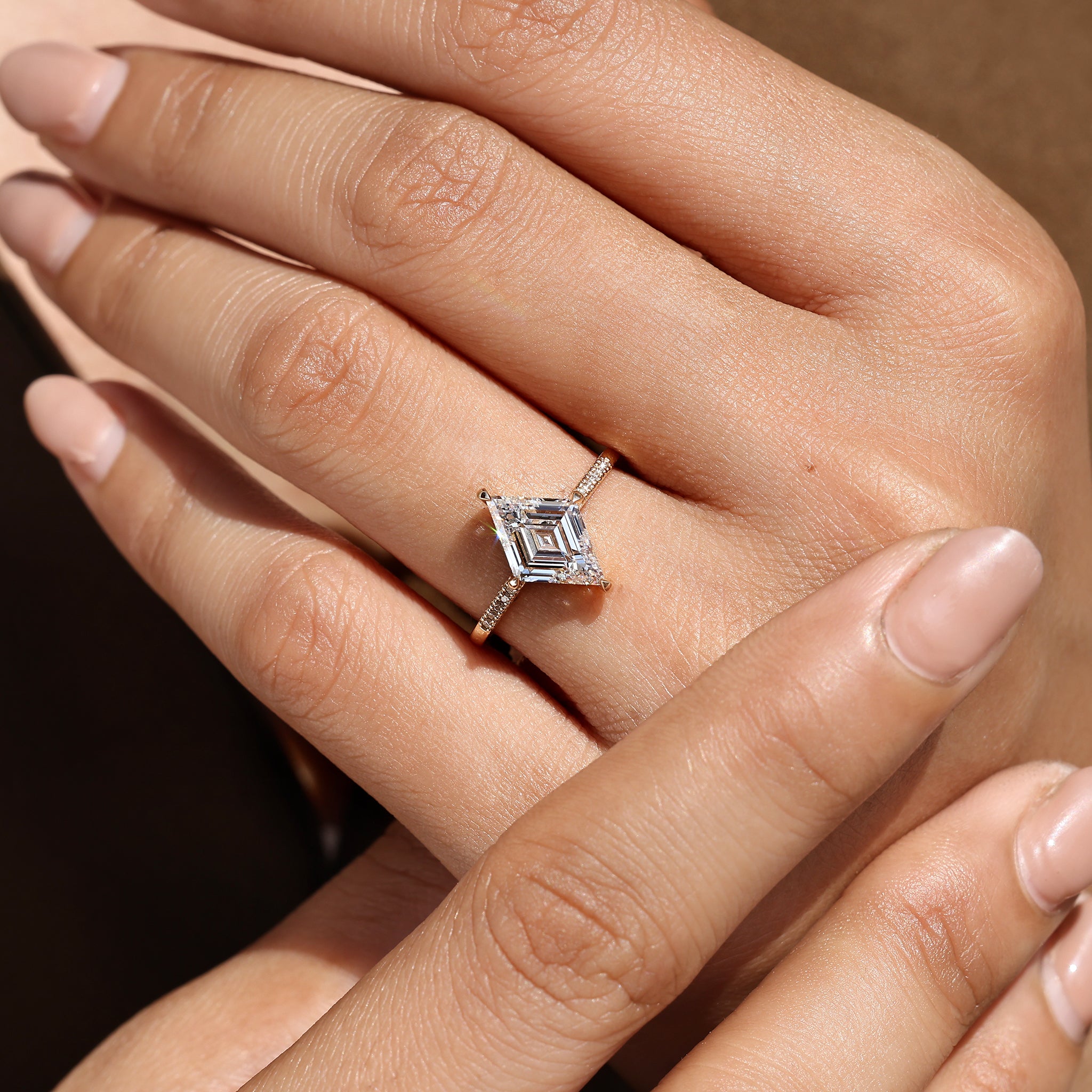 Handmade lozenge cut diamond ring design.
