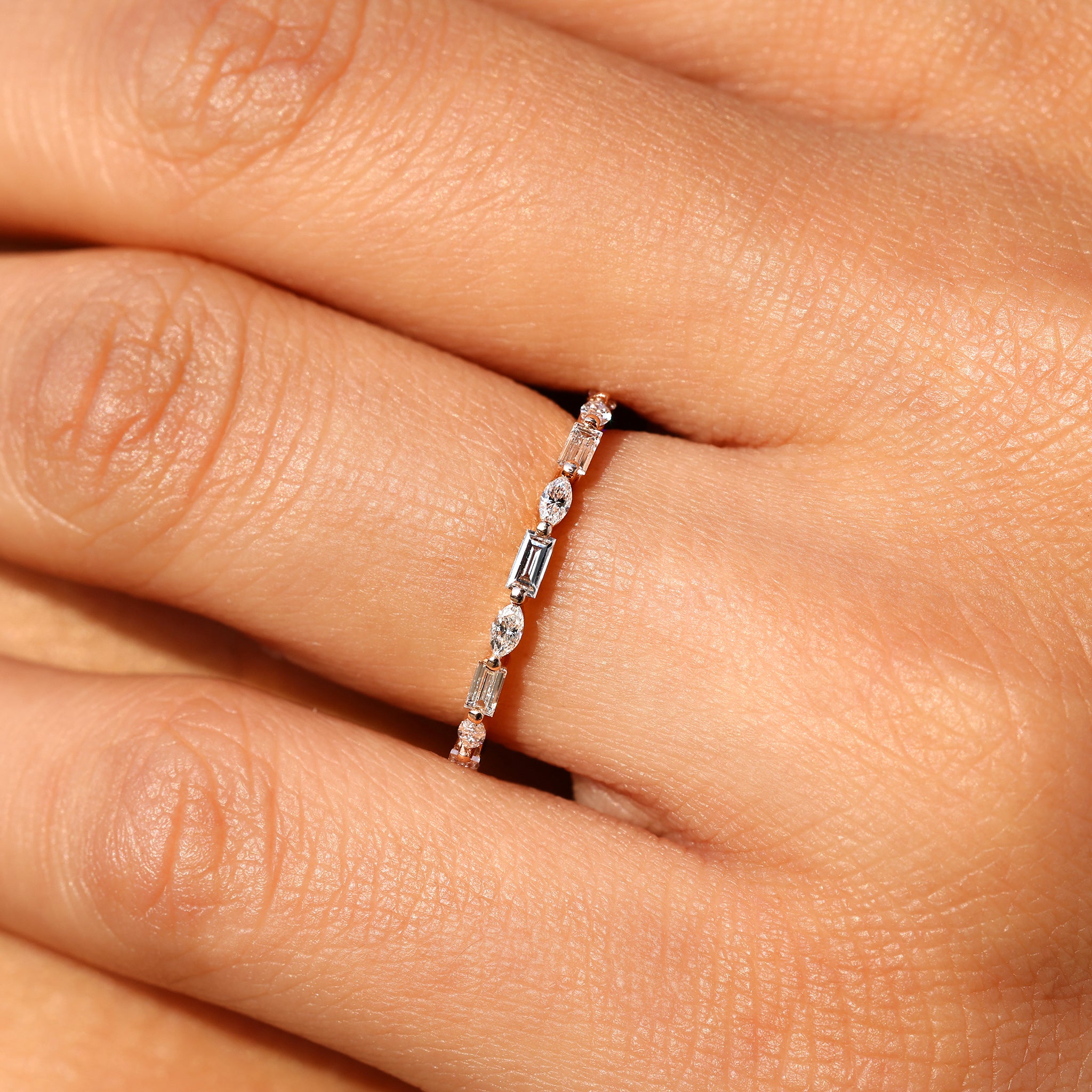 Marquise and baguette diamond full eternity band.
