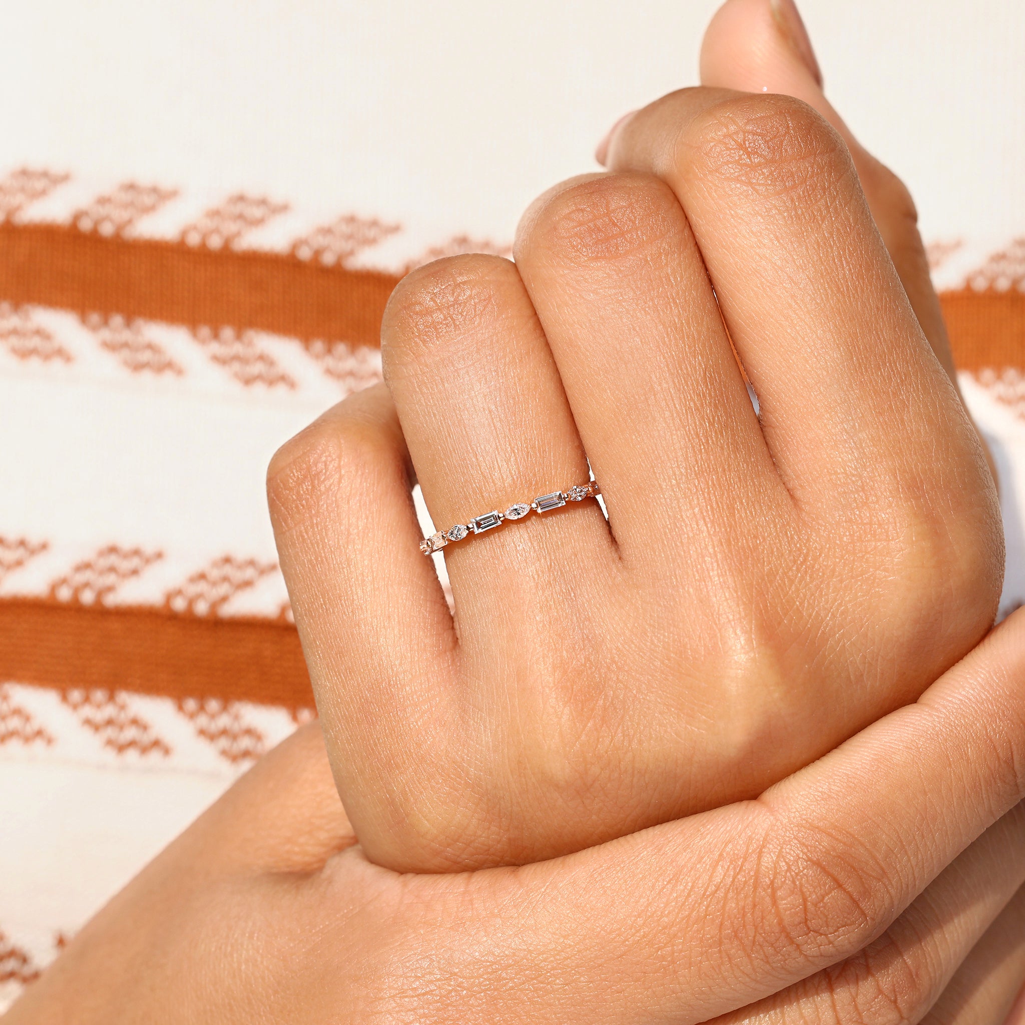 Lab grown diamond eternity band with shared prong setting.
