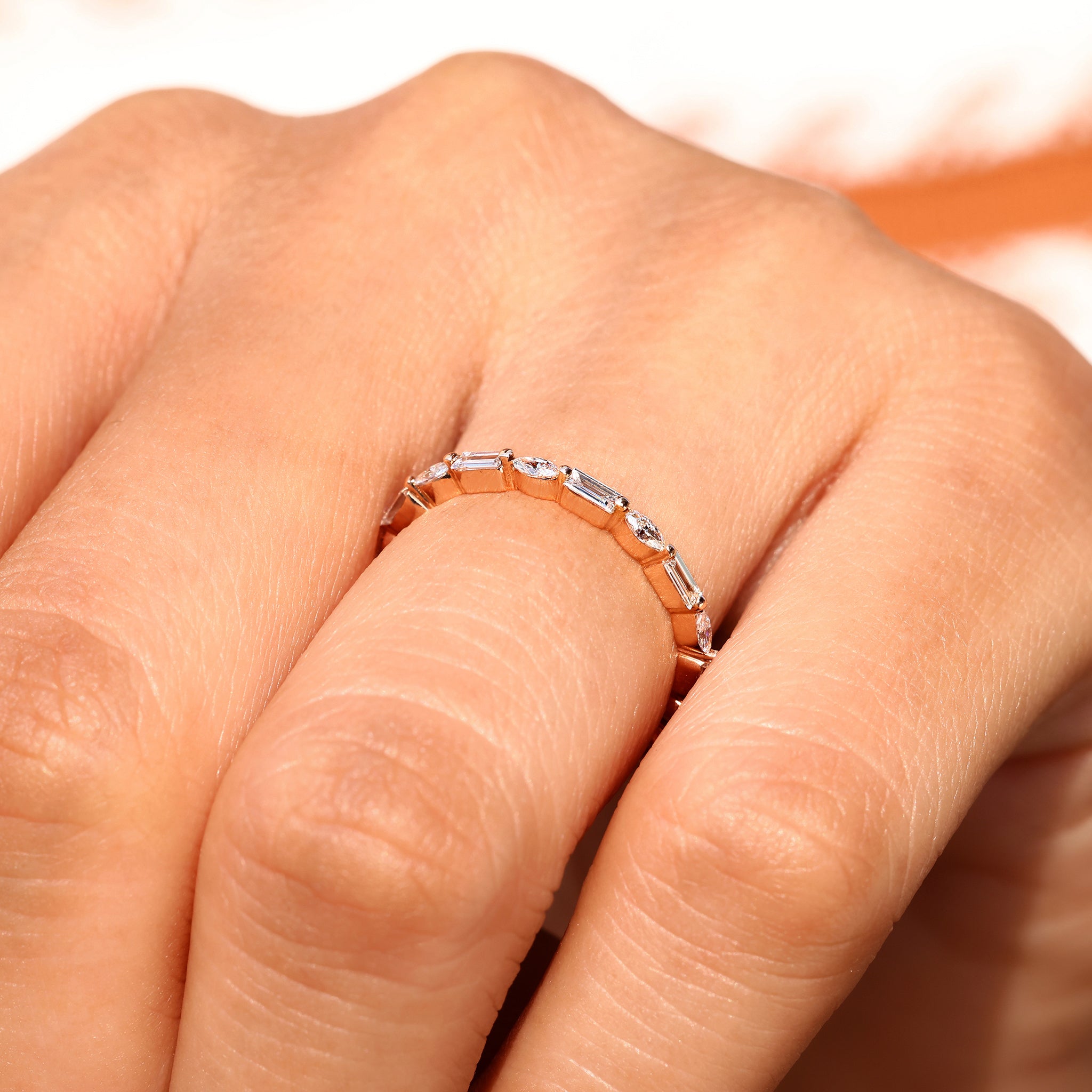Lab grown marquise baguette diamond eternity band.
